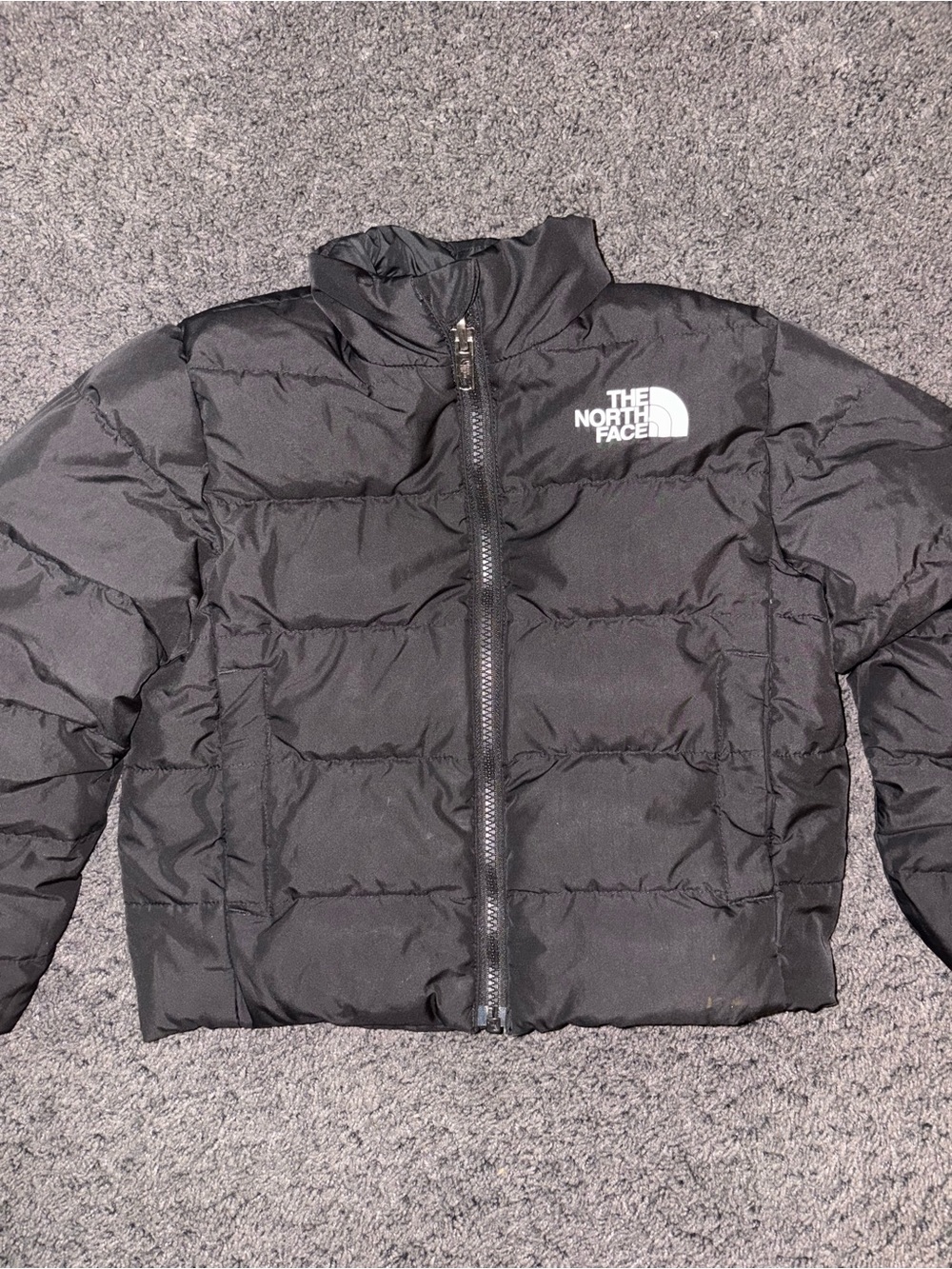 The North Face Kids Cropped Black Puffer Jacket size 6x *See photo for flaw